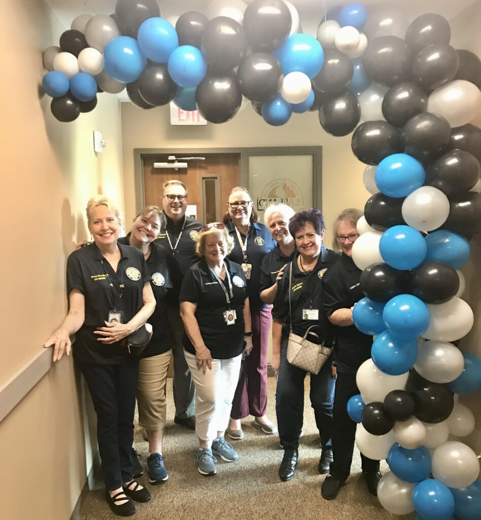 PCPAAA team celebration with balloons